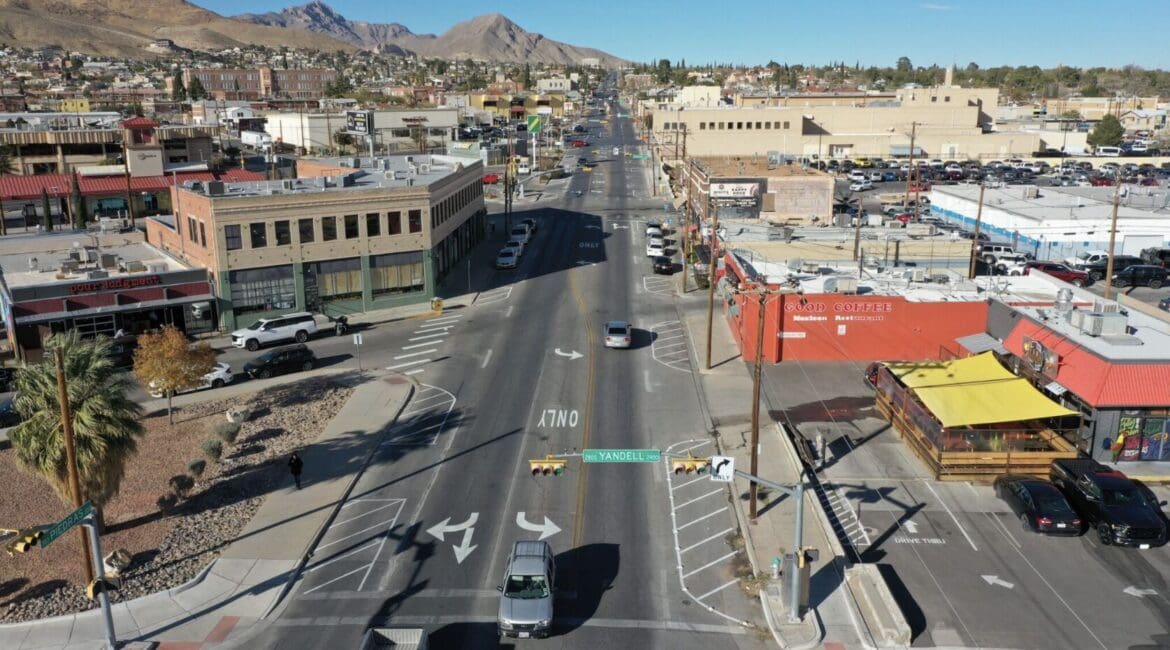 Aerial view of an urban street intersection showcasing infrastructure and potential areas for road safety improvements.